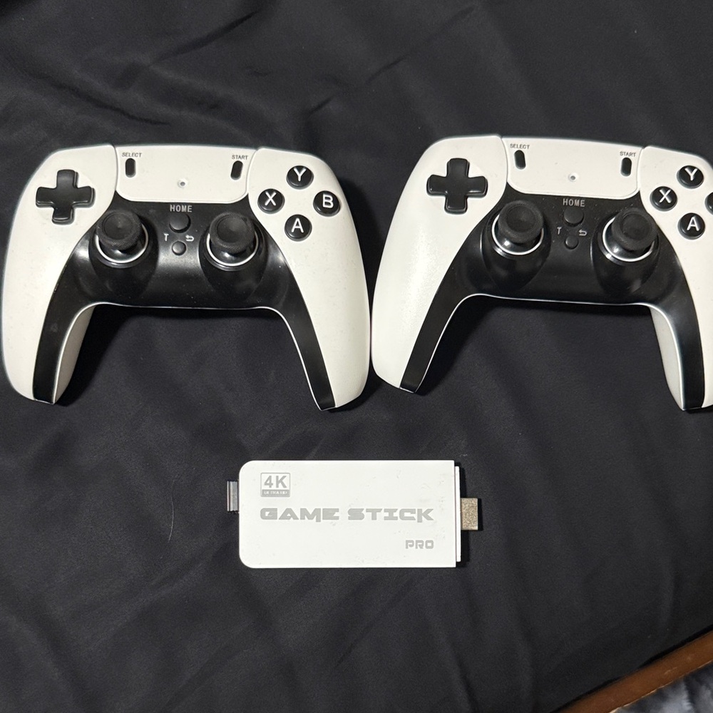 4K Game Stick Pro with Two White Wireless Controllers